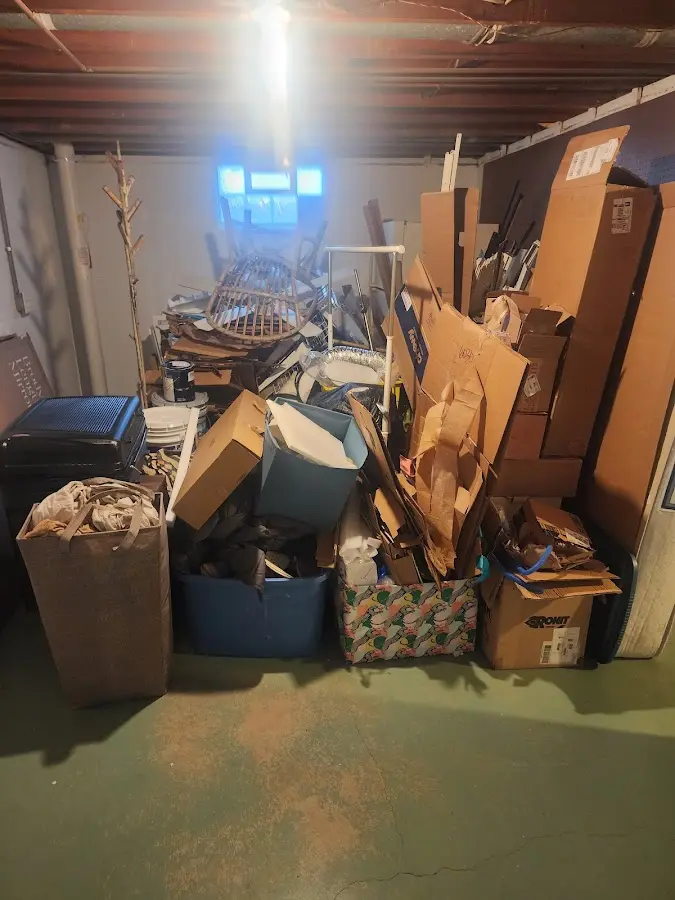 Roll-off dumpster container at job site for 2 Yard Dumpster Rental in Perris